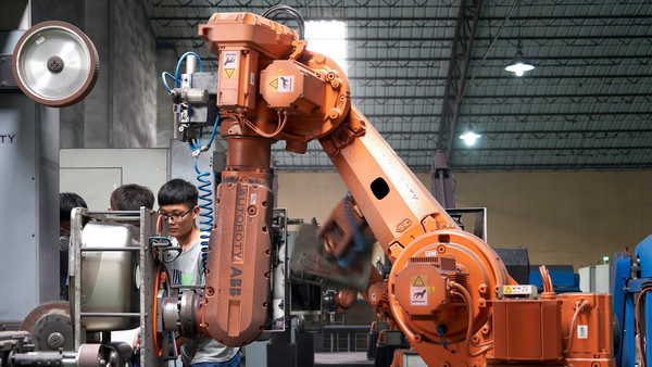 西媒评中国经济转型:"世界工厂"变"技术创新"国家